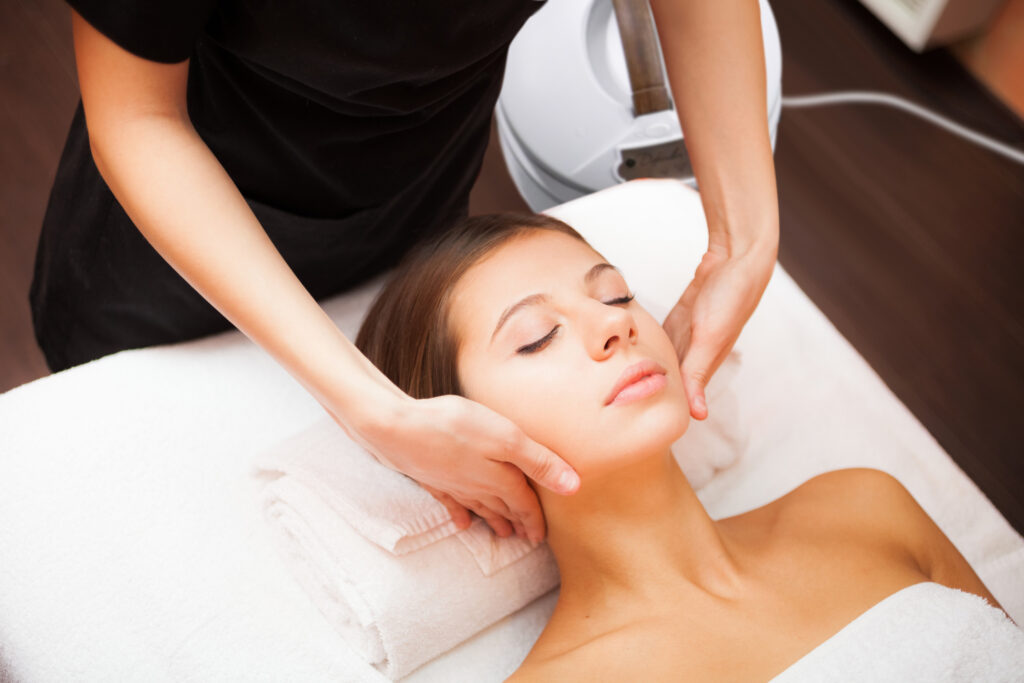 Beautiful woman receiving a facial massage